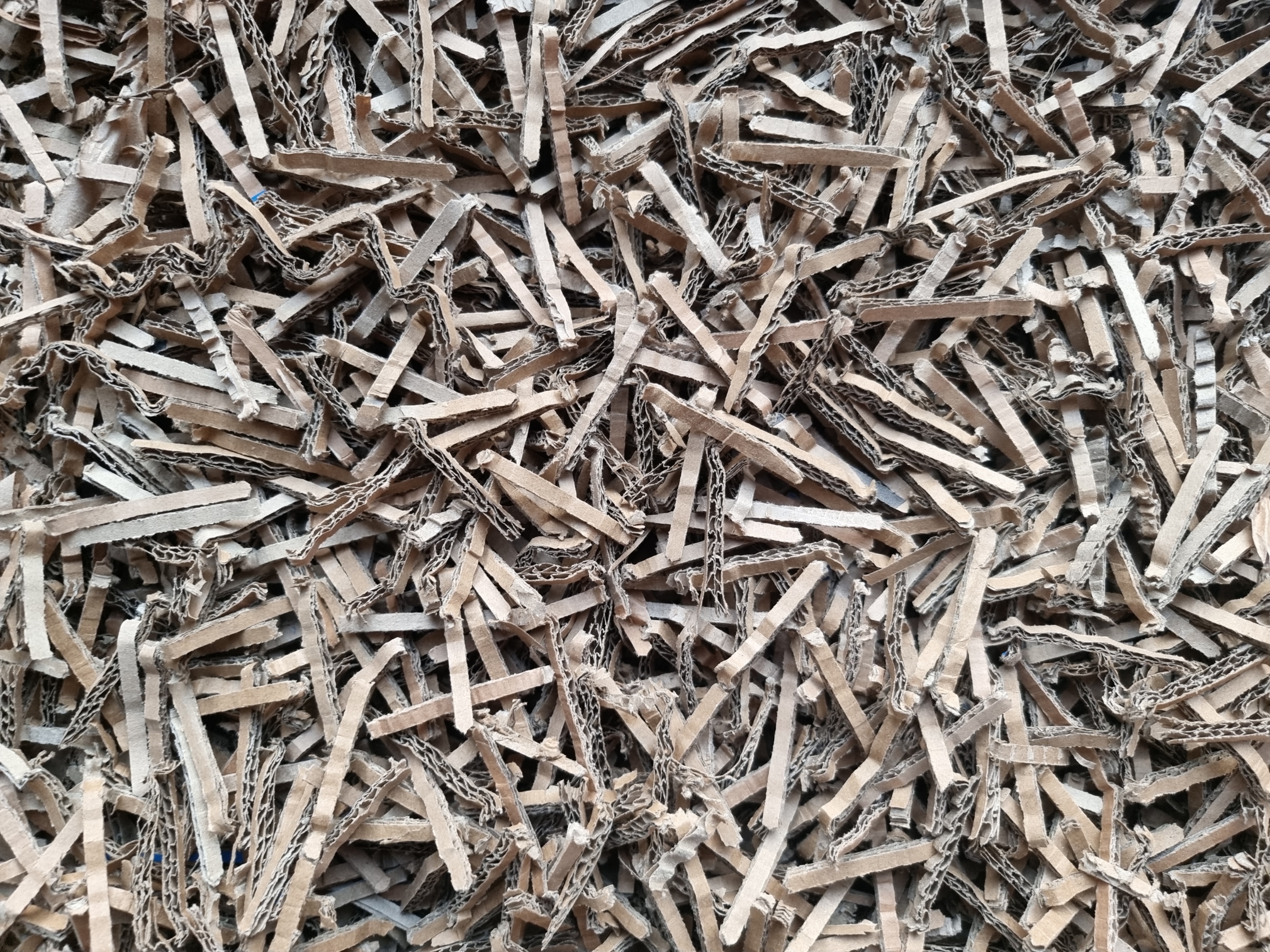 Shredded recycled cardboard as raw material